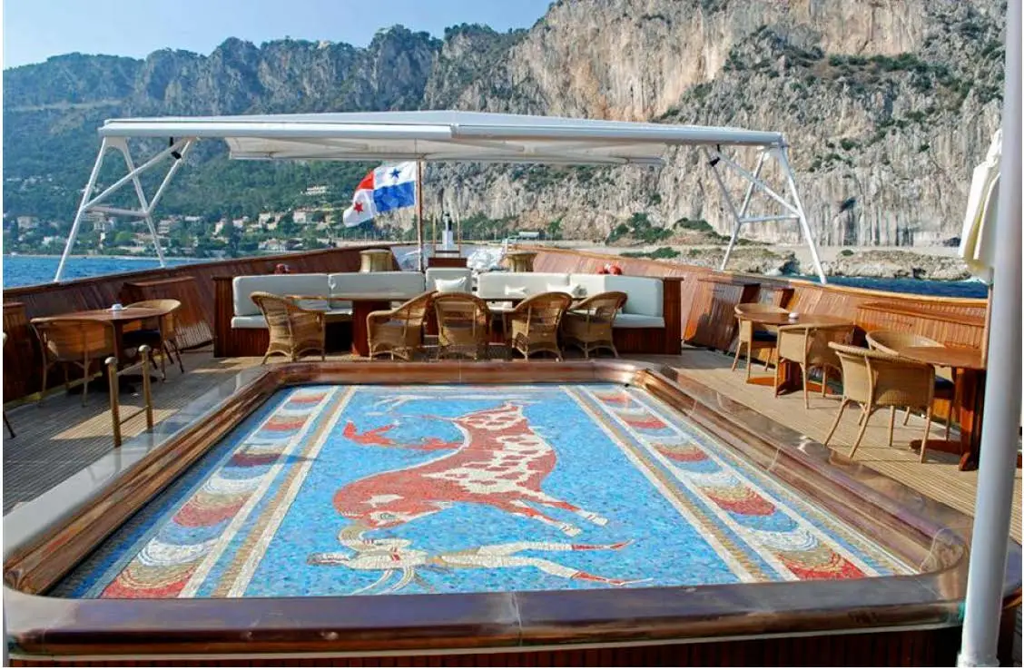 Minoan-style mosaic swimming pool on the teak sun deck of CHRISTINA O